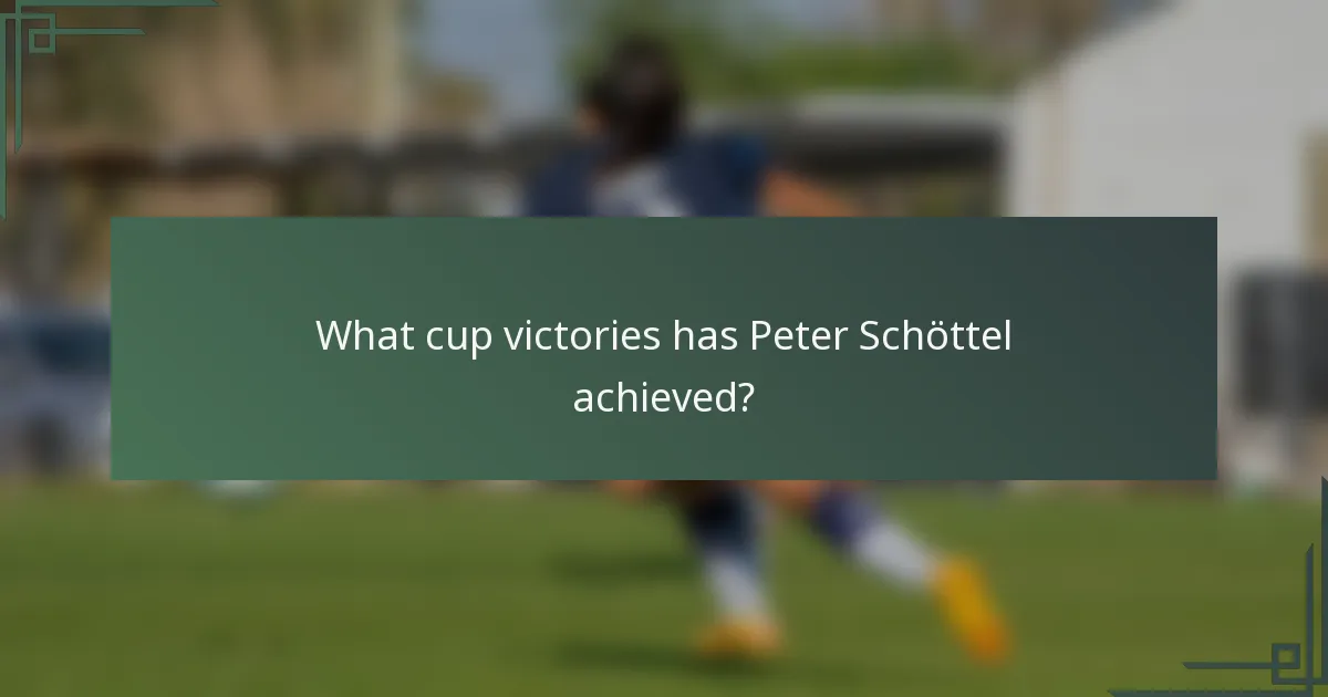 What cup victories has Peter Schöttel achieved?