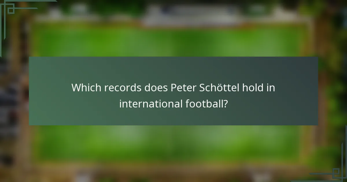 Which records does Peter Schöttel hold in international football?
